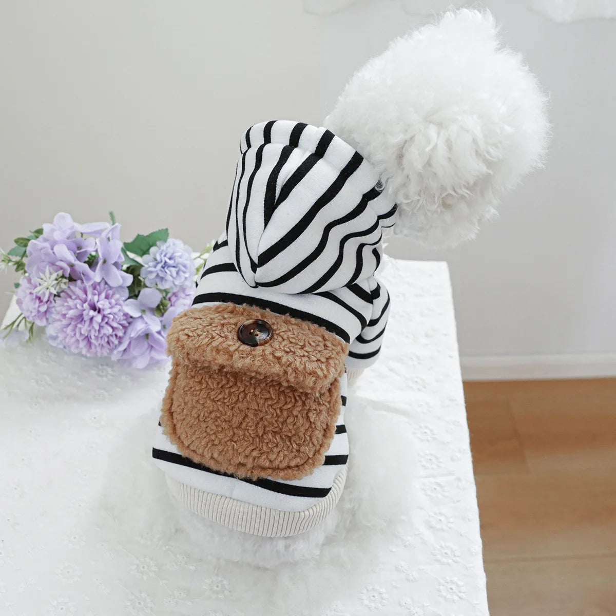 A cute striped hoodie for your small pup.